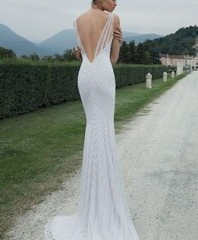 check out the gown from colin cowie weddings…